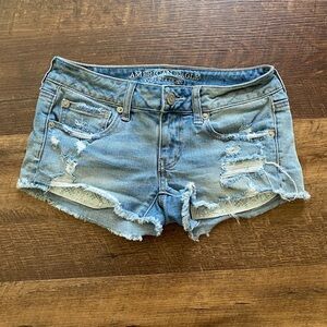 American Eagle super low shortie shorts | light wash distressed denim | size 2